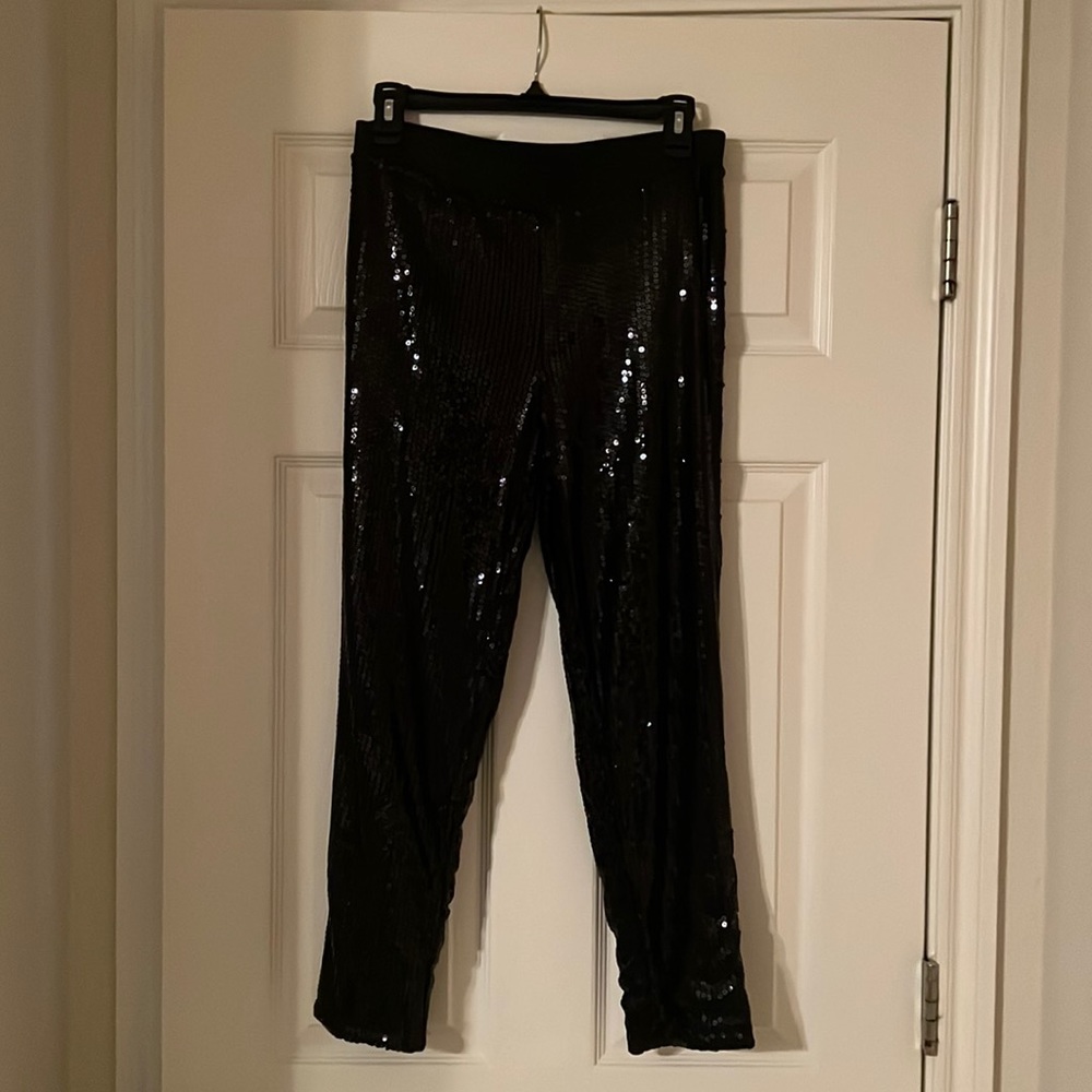 Black sequin jogger style pants.  Size medium.
